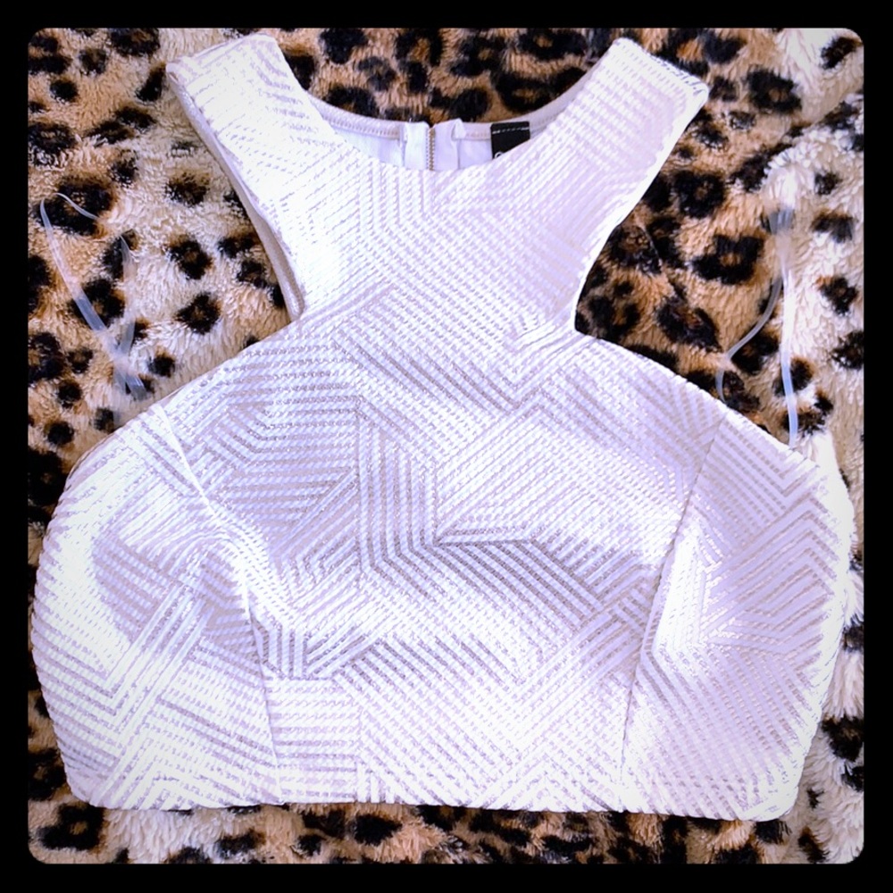 White and gold crop top.